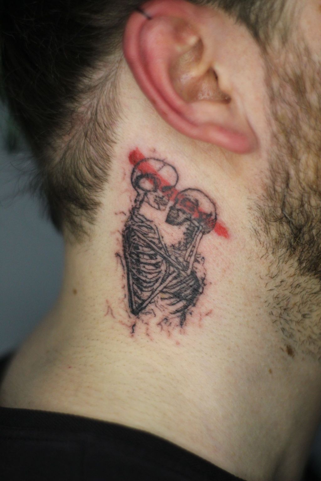 Creative Tattoo Art: The Bold Red Brush&nbsp;Stroke